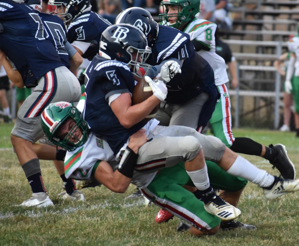 Thunderstorm lights up sky, Barnesville Shamrocks light up Buckeye
